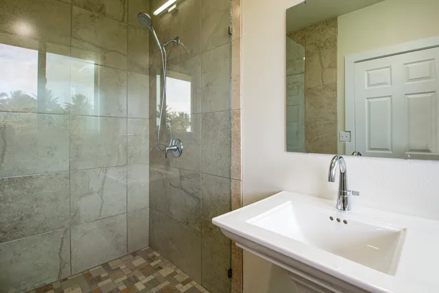 a bathroom with a sink and a mirror