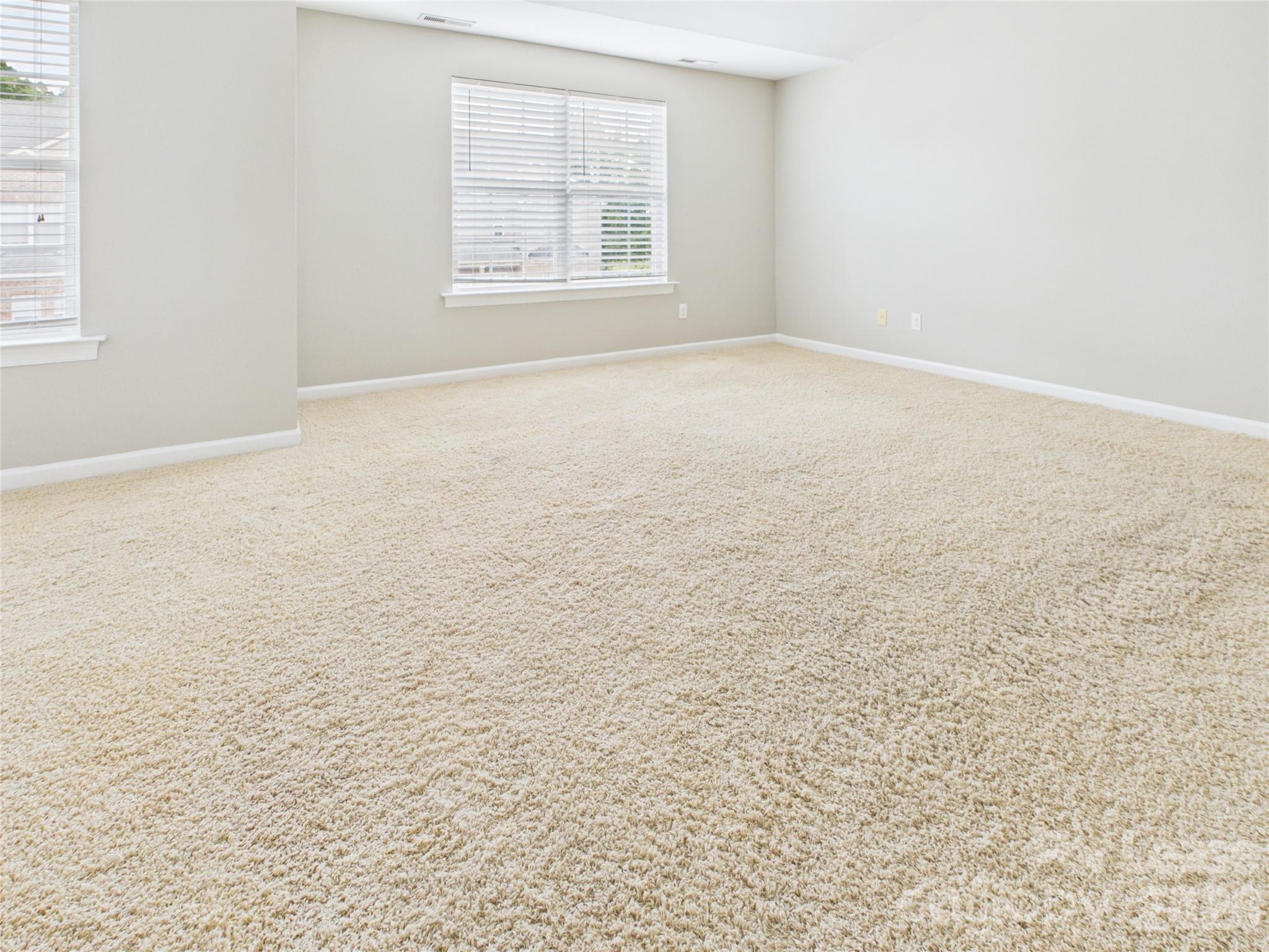 5690 Stafford Road Charlotte, NC 28215 - Photo 15 of 25 an empty room with windows
