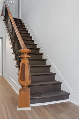 a kitchen with stainless steel appliances a refrigerator and a stove