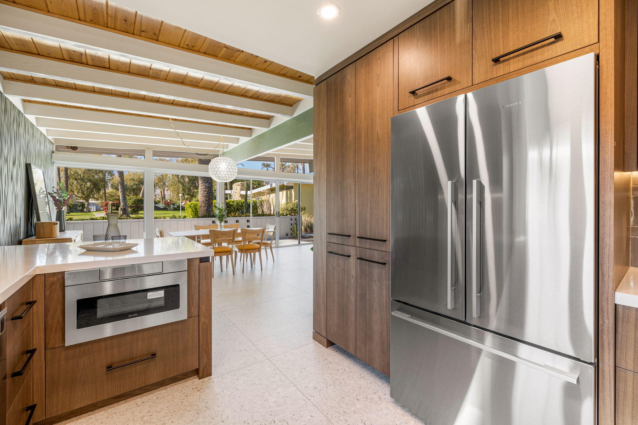 36903 Palm View Road Rancho Mirage, CA 92270 - Photo 13 of 58 a kitchen with stainless steel appliances a refrigerator and cabinets