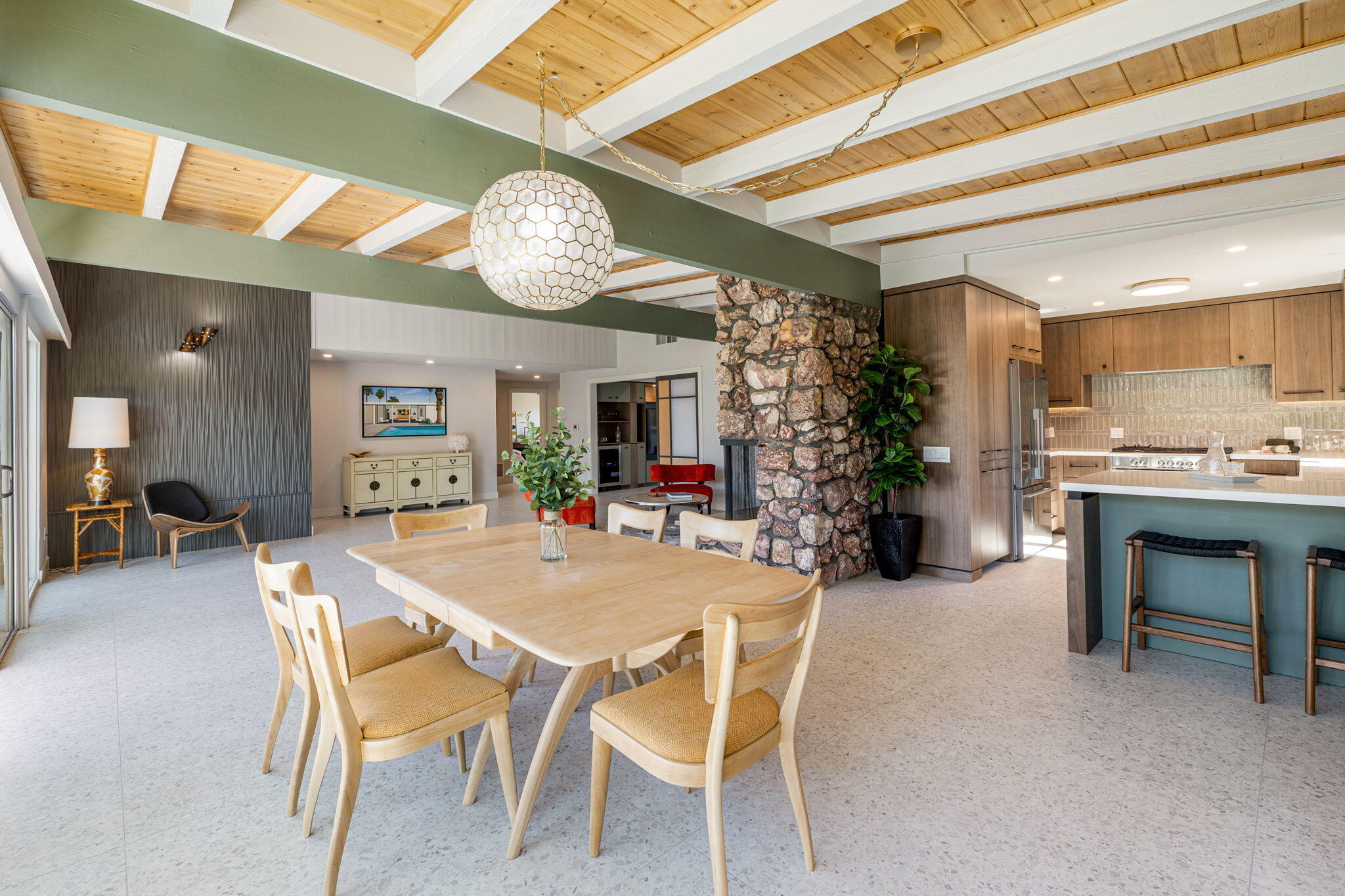36903 Palm View Road Rancho Mirage, CA 92270 - Photo 17 of 58 a view of a dining room with furniture and a chandelier