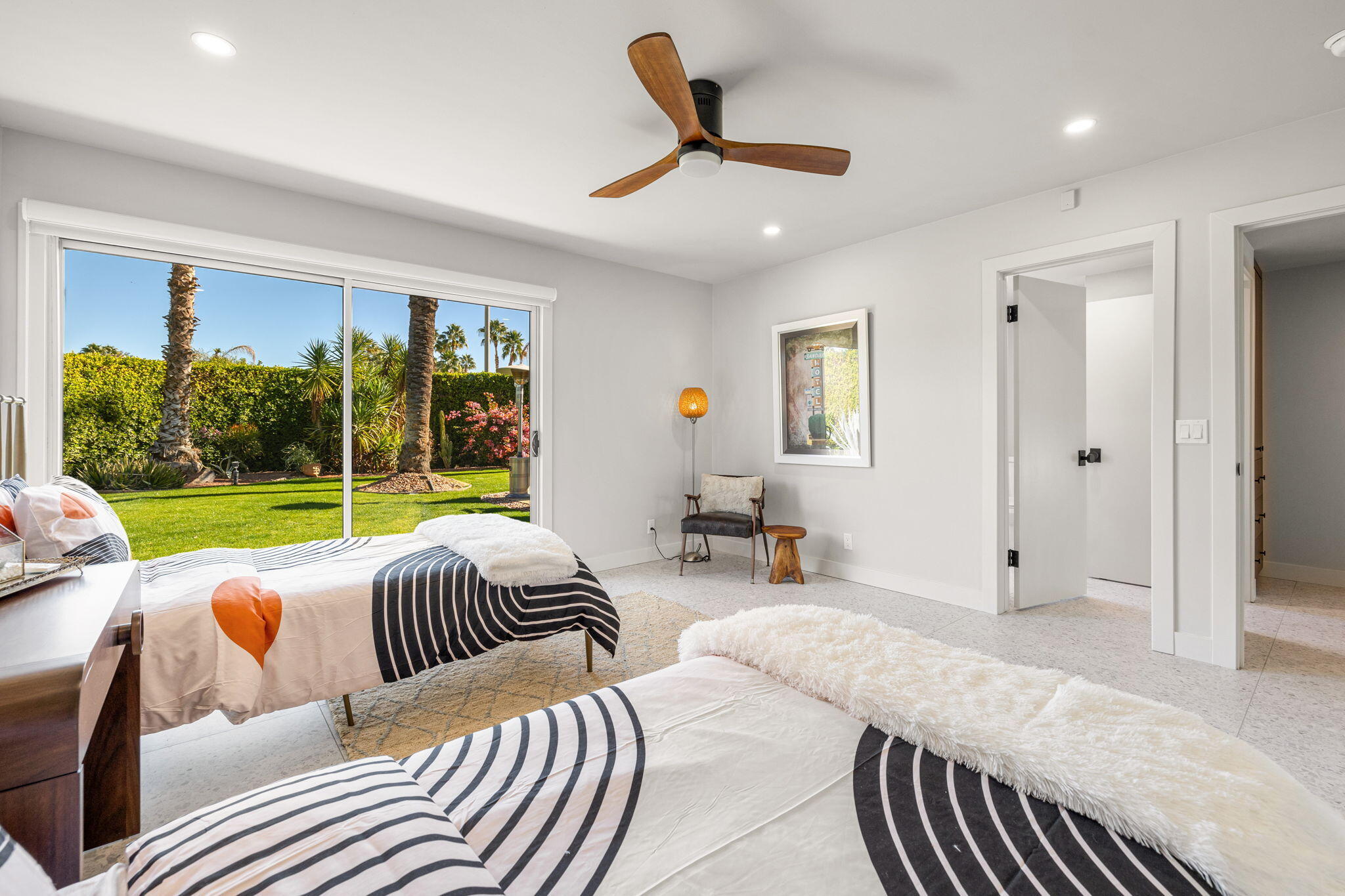 36903 Palm View Road Rancho Mirage, CA 92270 - Photo 29 of 58 a living room with furniture and a floor to ceiling window