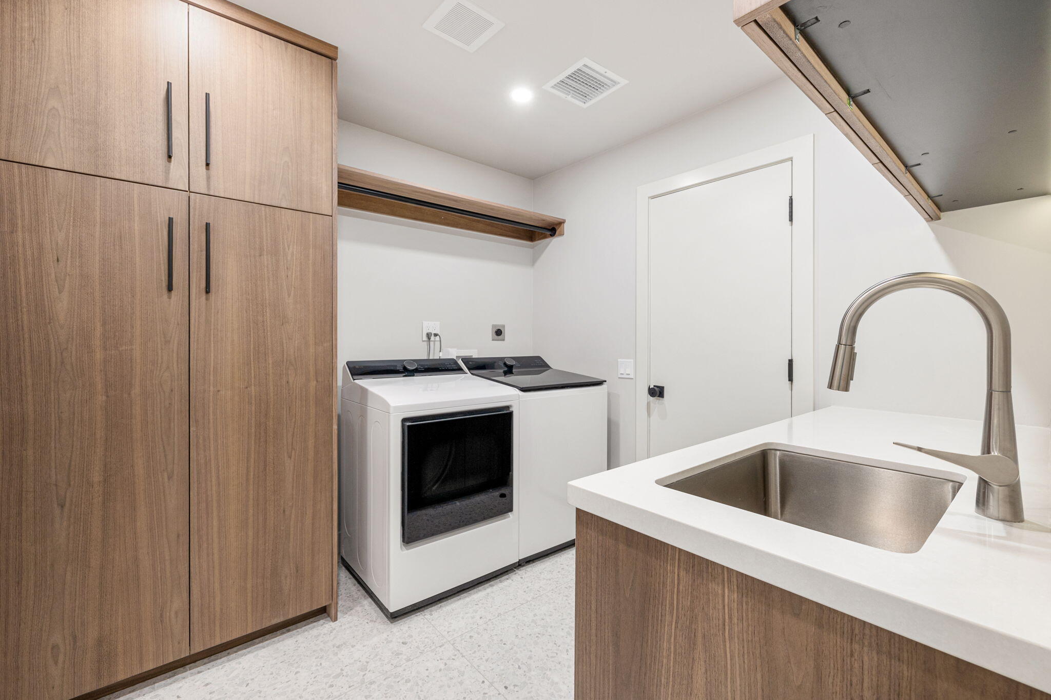 36903 Palm View Road Rancho Mirage, CA 92270 - Photo 34 of 58 a close view of a sink and a dishwasher in a kitchen