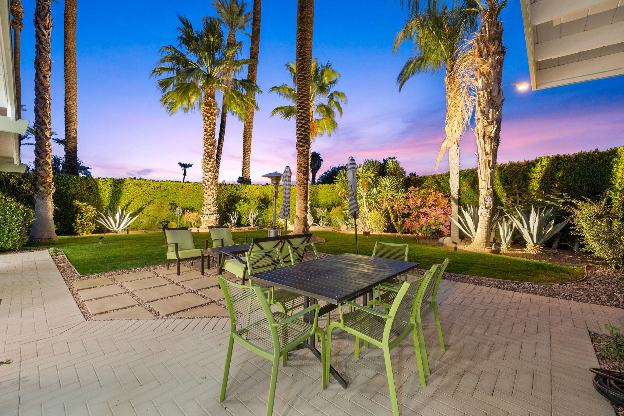 36903 Palm View Road Rancho Mirage, CA 92270 - Photo 39 of 58 a view of a backyard with plants and a patio