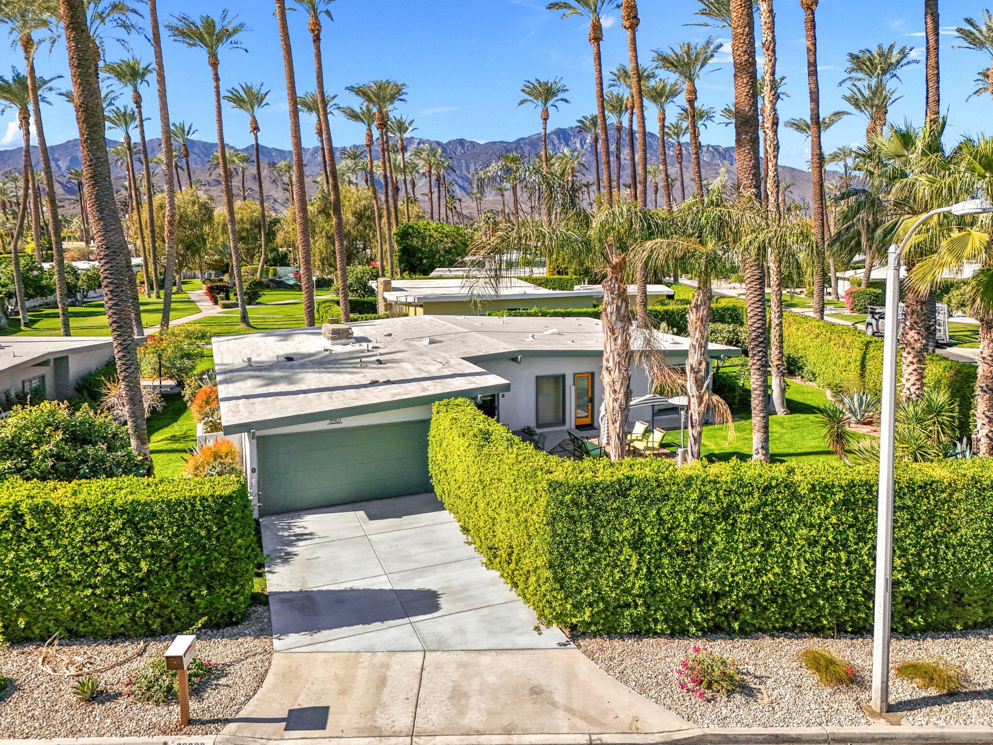 36903 Palm View Road Rancho Mirage, CA 92270 - Photo 51 of 58 a view of a swimming pool with a patio