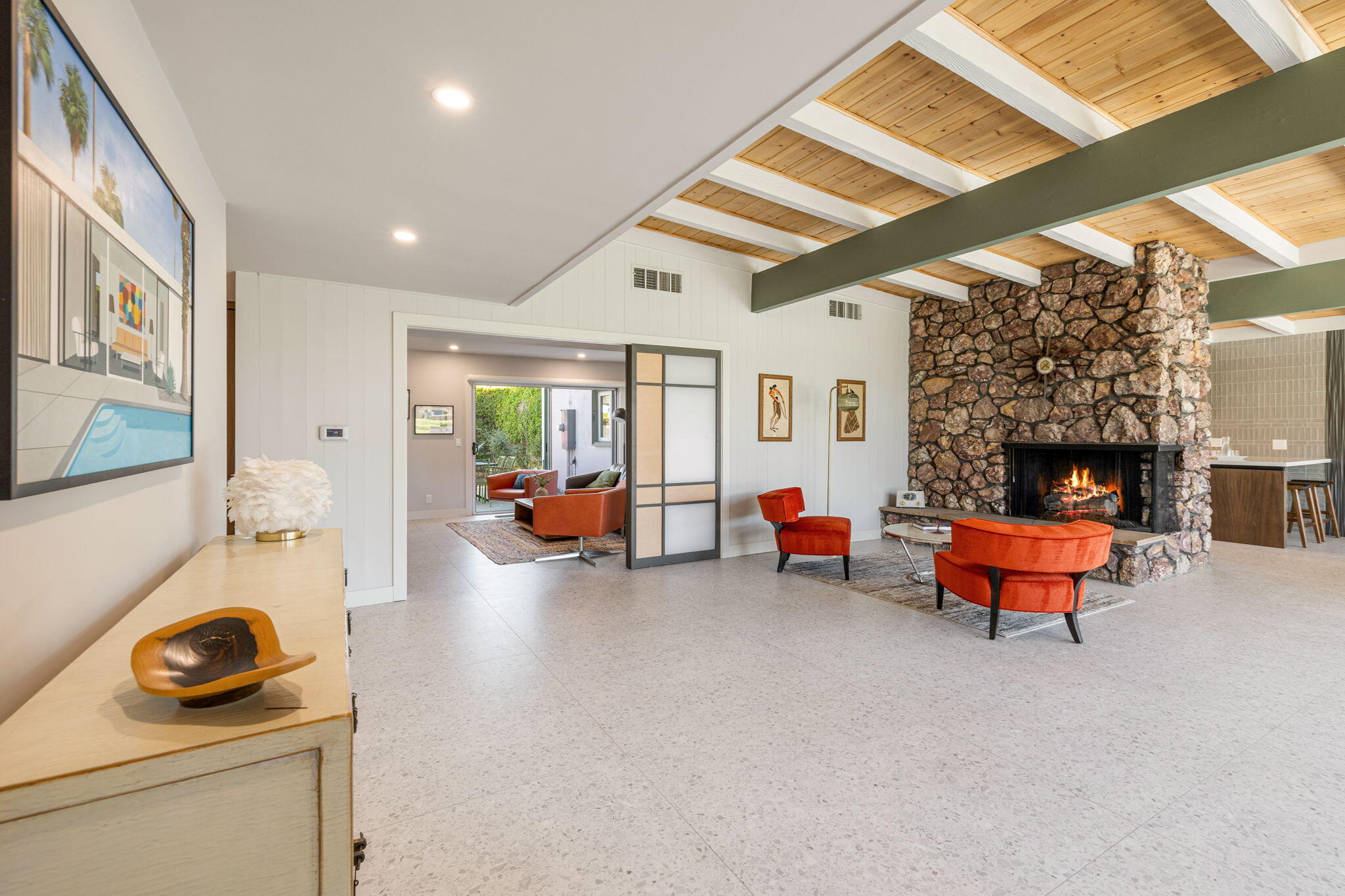 36903 Palm View Road Rancho Mirage, CA 92270 - Photo 8 of 58 a view of a livingroom with lounge chair and a fireplace