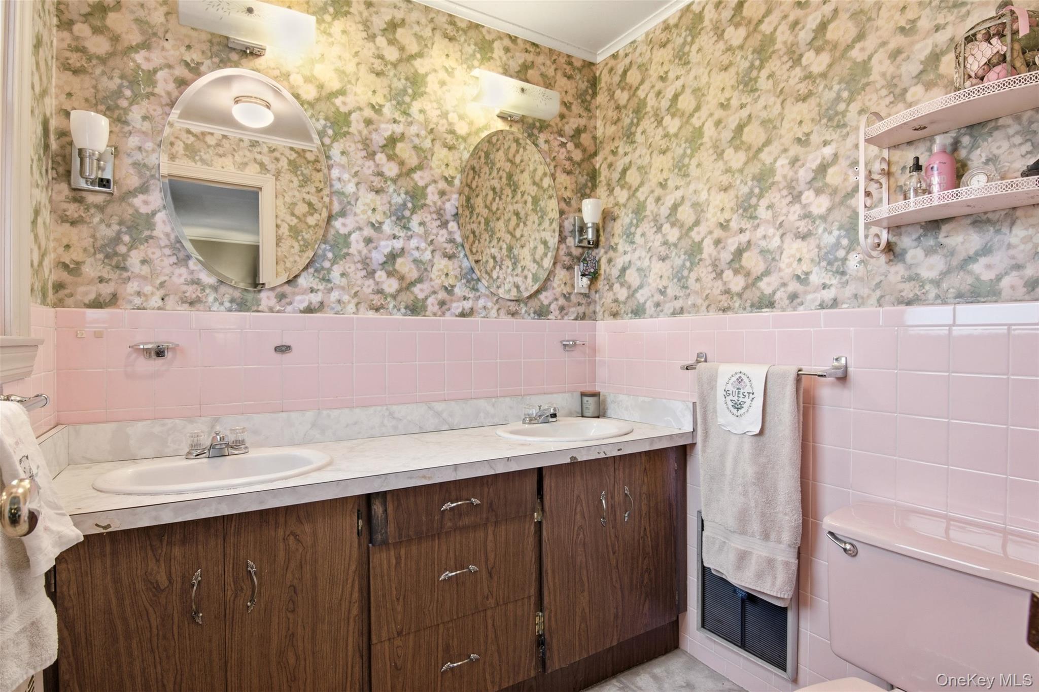 8 Old Wood Road Stony Brook, NY 11790 - Photo 15 of 50 Bathroom featuring wallpapered walls, a wainscoted wall, double vanity, and tile walls