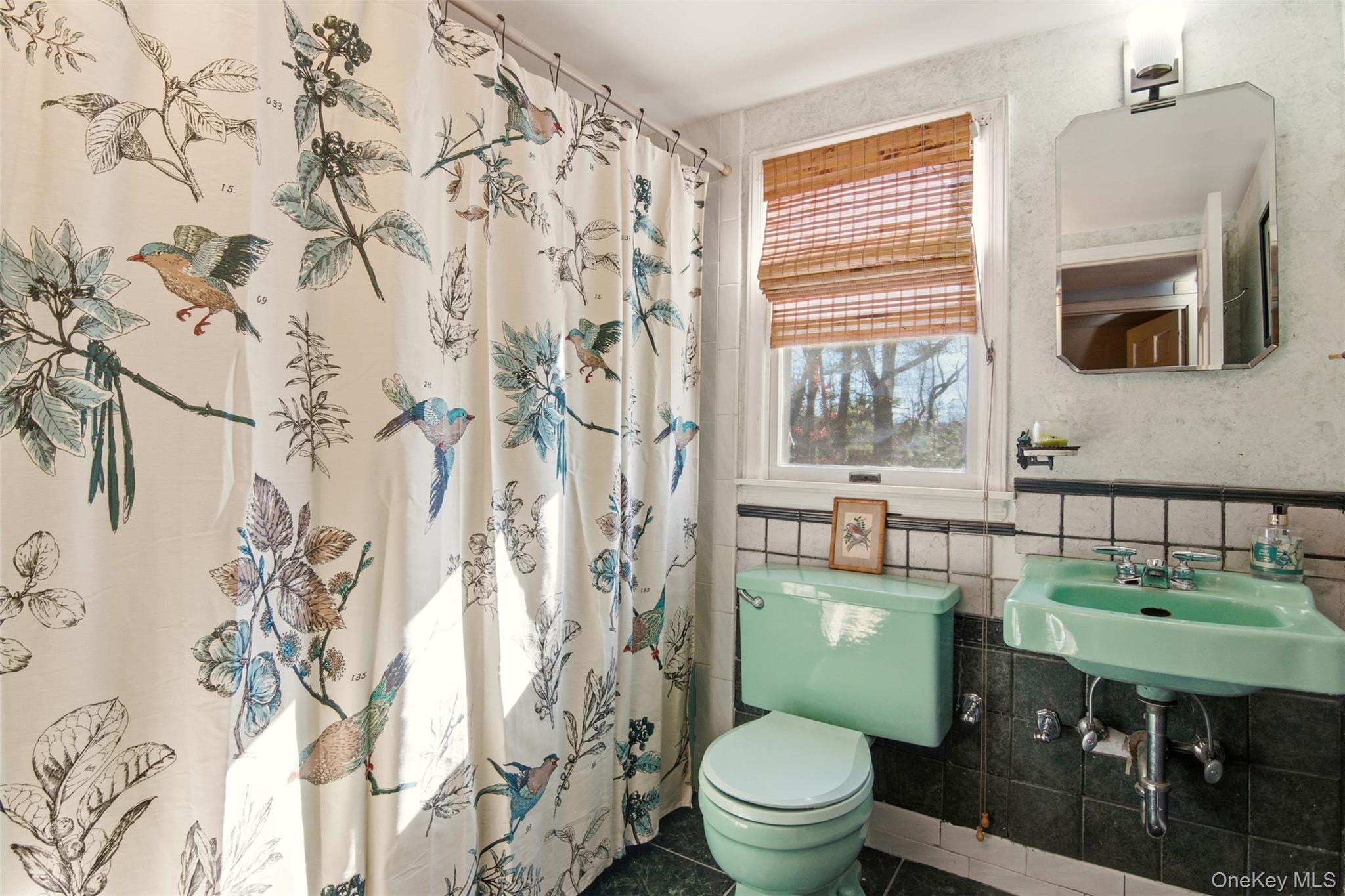 8 Old Wood Road Stony Brook, NY 11790 - Photo 17 of 50 Full bath featuring a shower with shower curtain, tile walls, and tile patterned floors