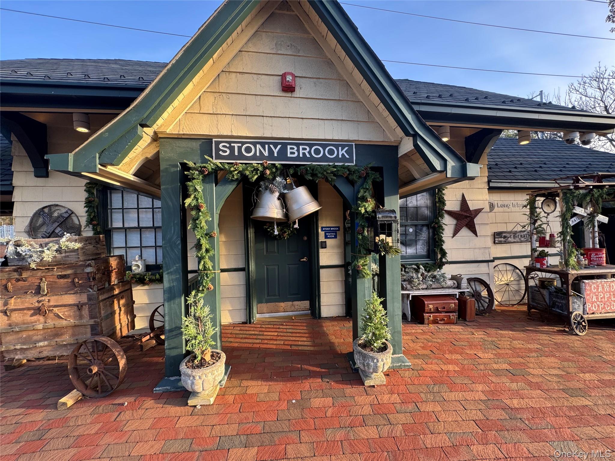 8 Old Wood Road Stony Brook, NY 11790 - Photo 39 of 50 View of exterior entry with a shingled roof