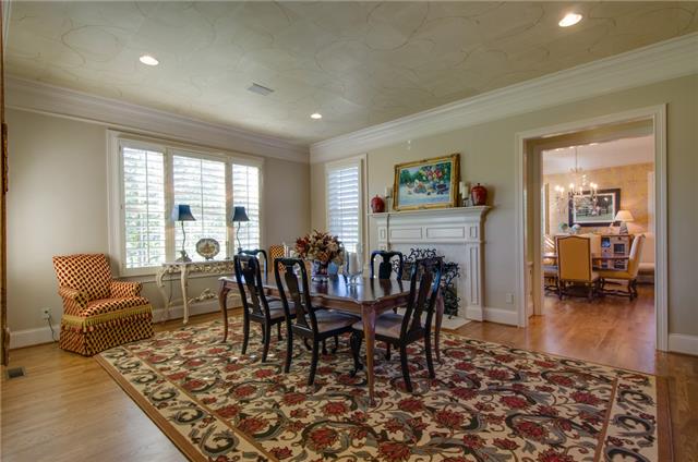 3242 Kinnard Springs Road Franklin, TN 37064 - Photo 11 of 21 Hugh Dining Room With Fireplace. Butlers Pantry Just Around the Corner with Cabinet Space, Warming Drawer and Extra Fridge and Freezer