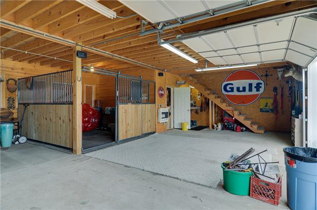 3242 Kinnard Springs Road Franklin, TN 37064 - Photo 21 of 21 Barn - Open Area and Workshop Stairs to Walk In Attic Storage Full Length of Building. 2 Garage Bay Doors in Back.