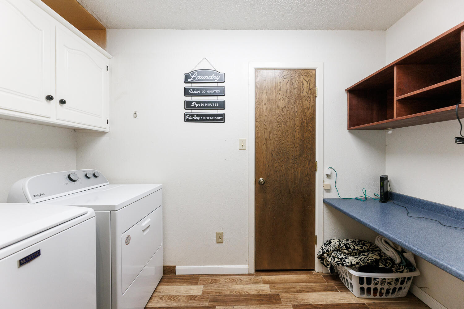 705 Grace Street Brownfield, TX 79316 - Photo 37 of 43 a room with storage and utility