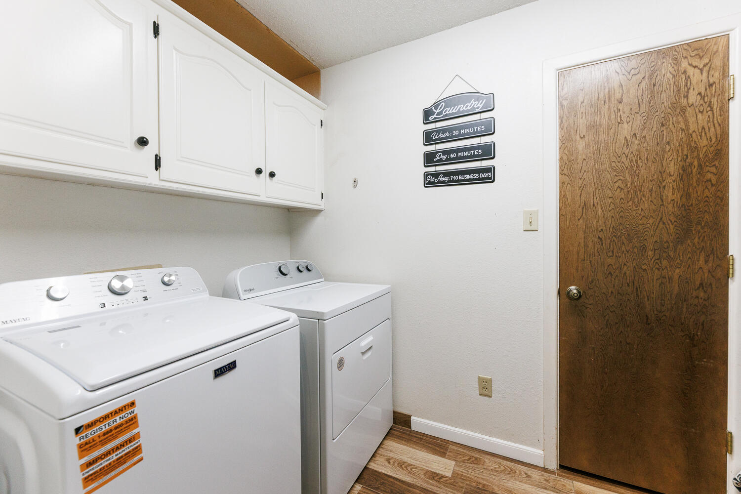 705 Grace Street Brownfield, TX 79316 - Photo 38 of 43 a utility room with dryer and washer