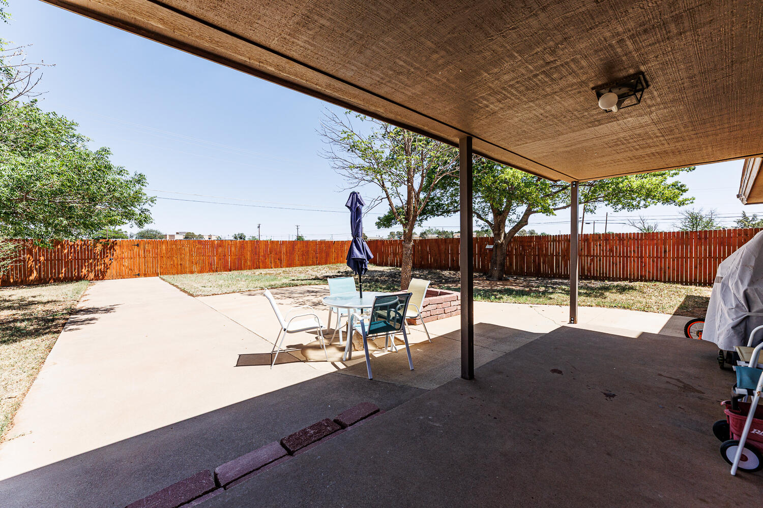 705 Grace Street Brownfield, TX 79316 - Photo 39 of 43 a view of a swimming pool with a patio