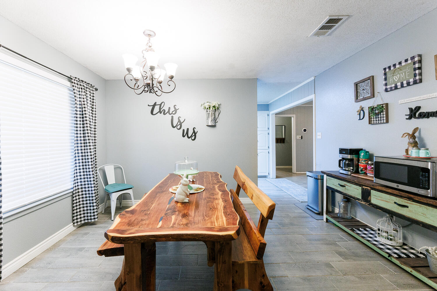 705 Grace Street Brownfield, TX 79316 - Photo 6 of 43 a dining room with furniture and wooden floor