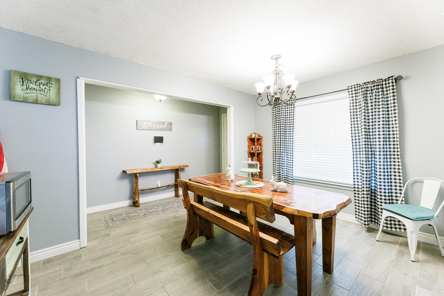 705 Grace Street Brownfield, TX 79316 - Photo 8 of 43 a dining room with furniture and window