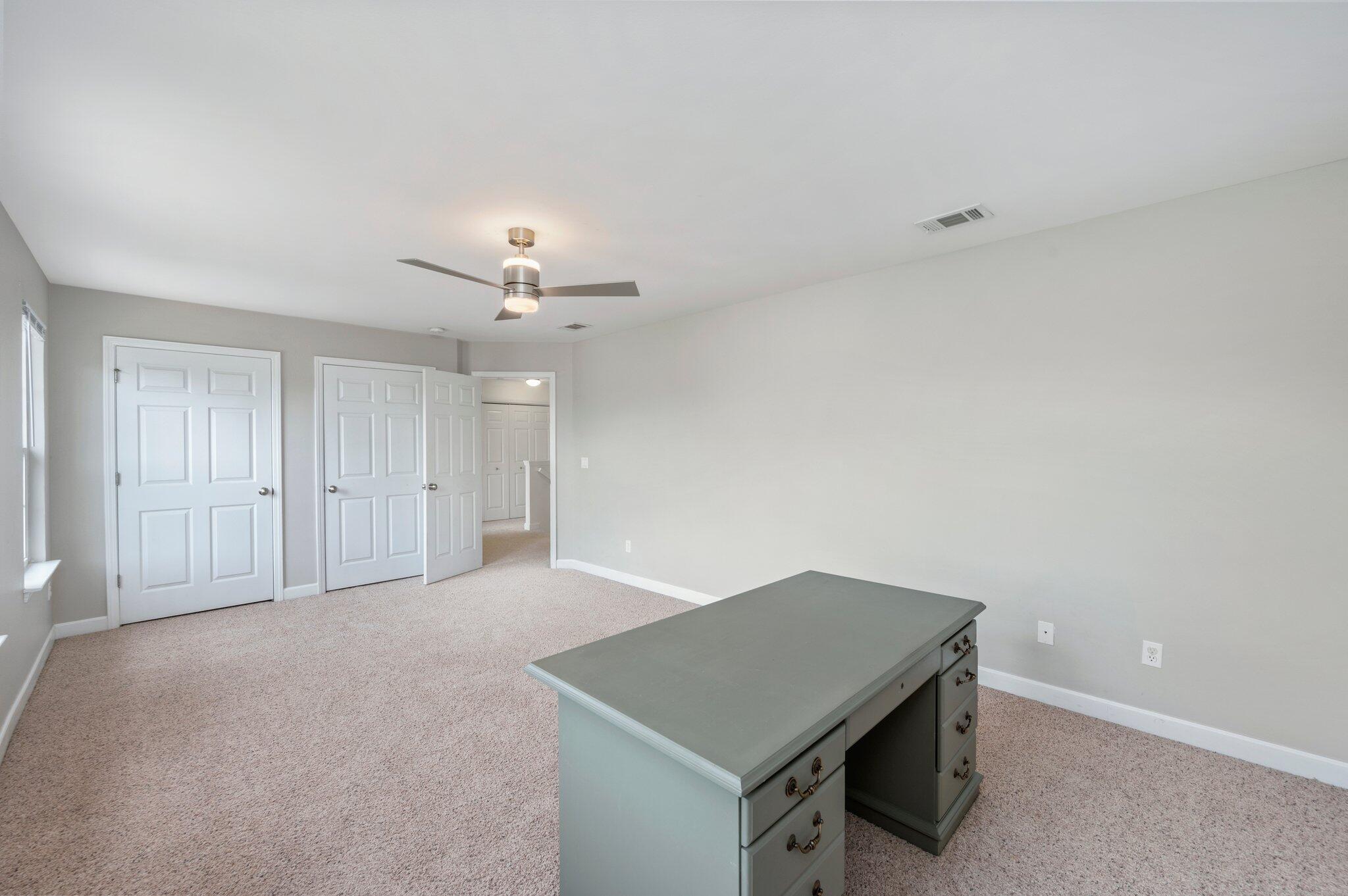 4635 Hermosa Road Crestview, FL 32539 - Photo 26 of 49 a view of an empty room with a cabinet