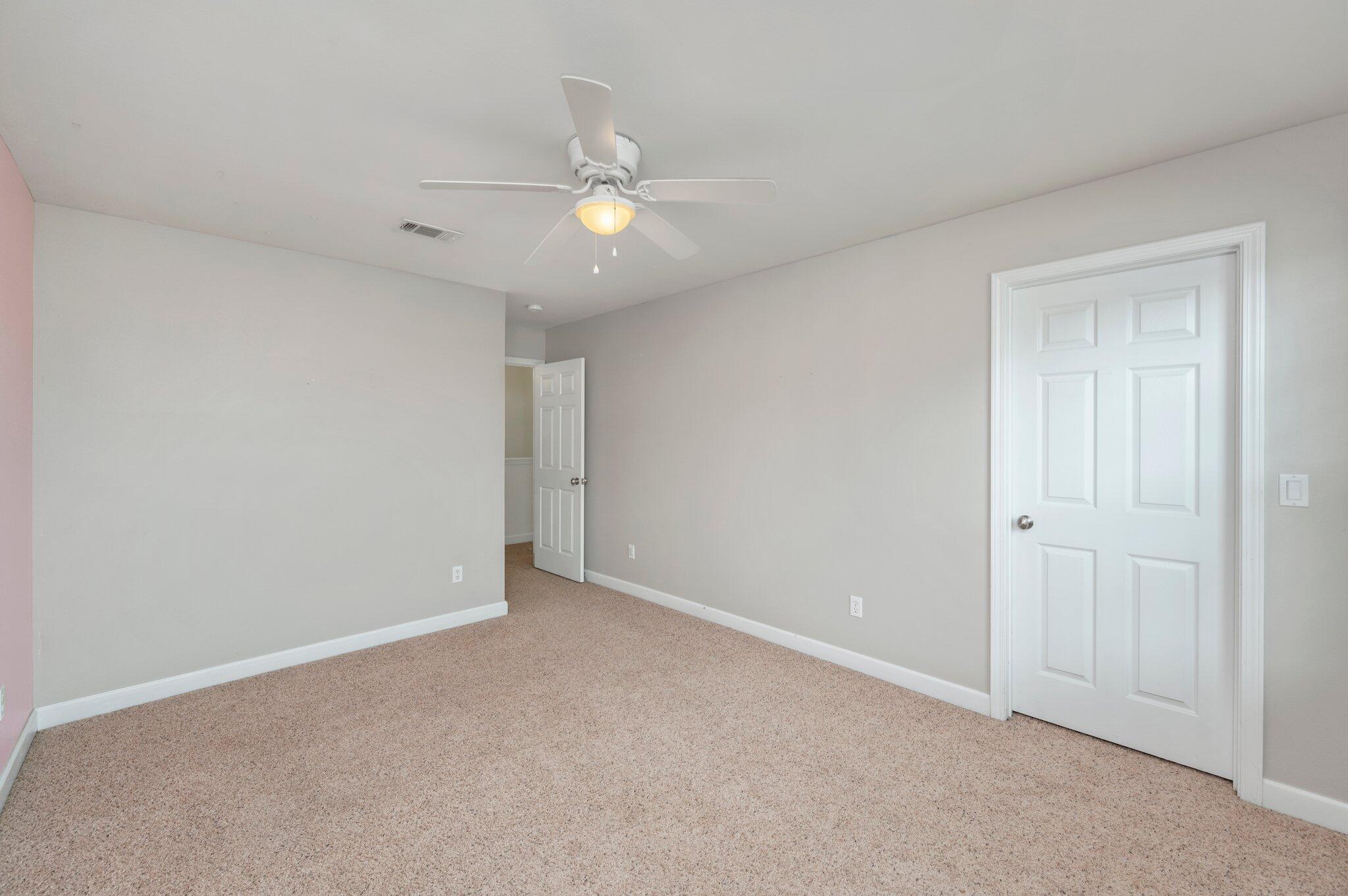 4635 Hermosa Road Crestview, FL 32539 - Photo 31 of 49 wooden floor in an empty room