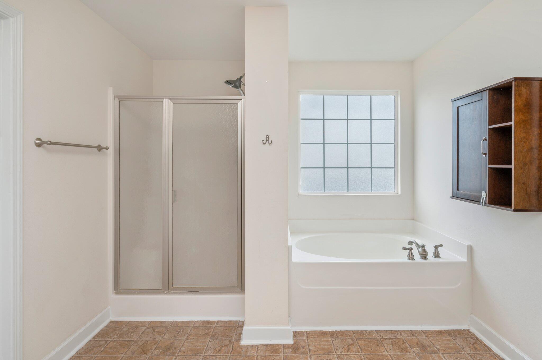 4635 Hermosa Road Crestview, FL 32539 - Photo 39 of 49 a white bath tub sitting next to a window