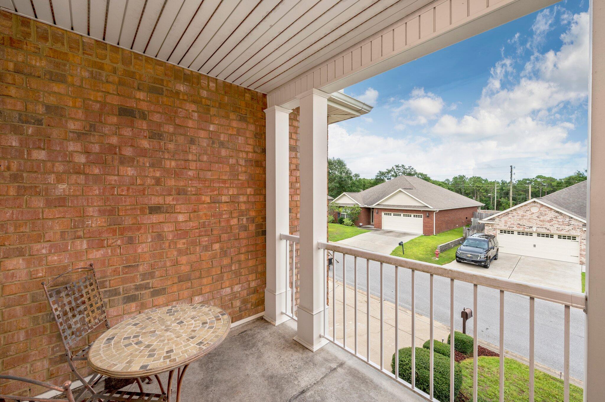 4635 Hermosa Road Crestview, FL 32539 - Photo 40 of 49 a view of a balcony with a furniture