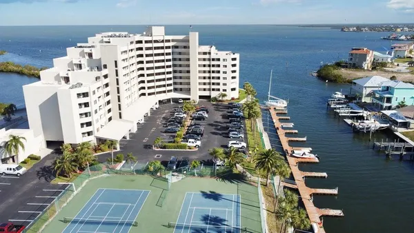 an aerial view of a multi story building