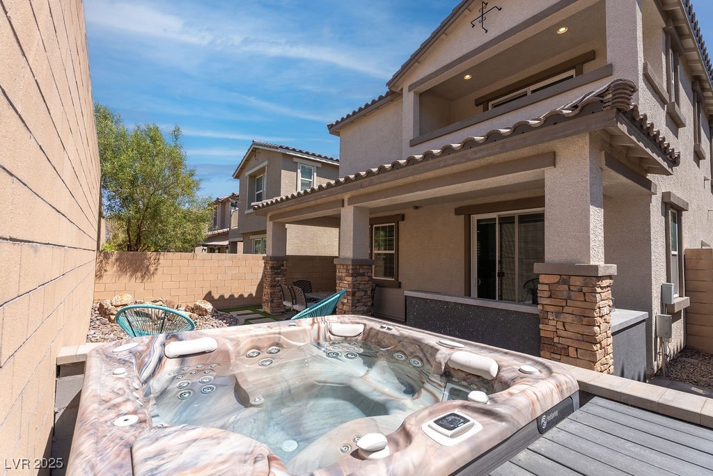 8099 Rams Collide Street Las Vegas, NV 89166 - Photo 17 of 72 Patio / terrace featuring an outdoor hot tub and a patio