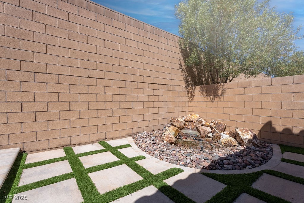 8099 Rams Collide Street Las Vegas, NV 89166 - Photo 30 of 72 View of fenced backyard