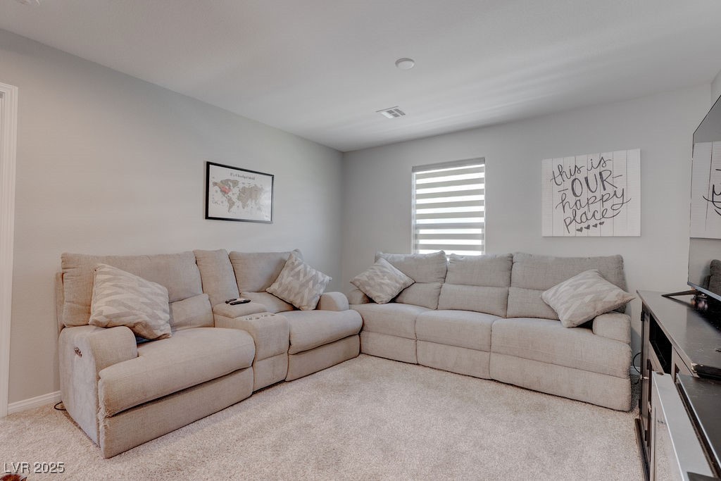 8099 Rams Collide Street Las Vegas, NV 89166 - Photo 43 of 72 View of carpeted living area