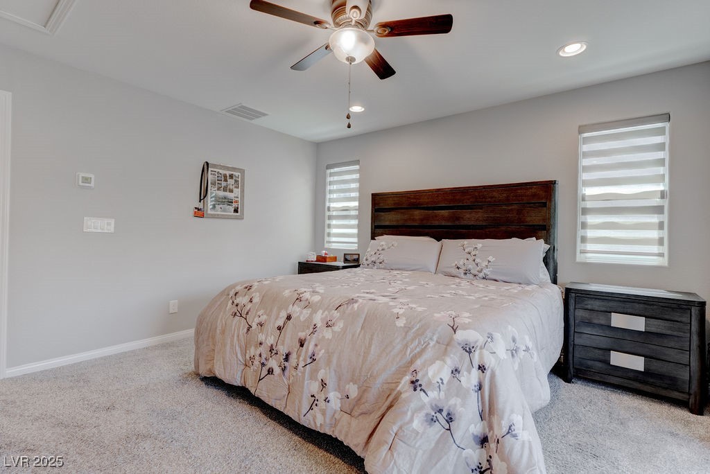 8099 Rams Collide Street Las Vegas, NV 89166 - Photo 49 of 72 Carpeted bedroom with recessed lighting and a ceiling fan
