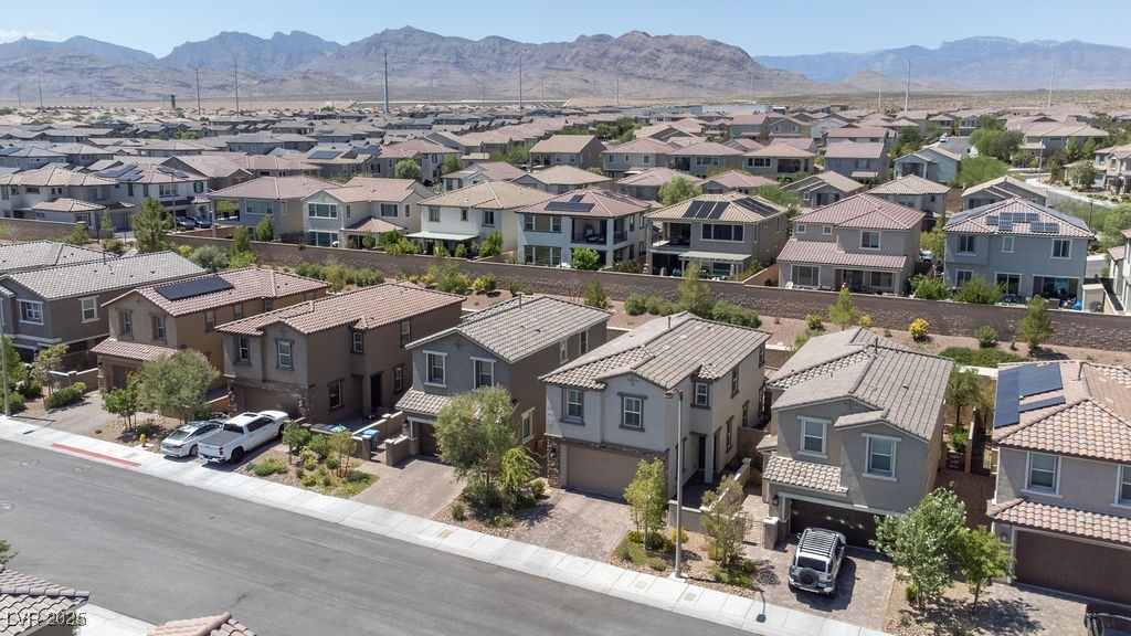 8099 Rams Collide Street Las Vegas, NV 89166 - Photo 57 of 72 Aerial view of a mountain backdrop