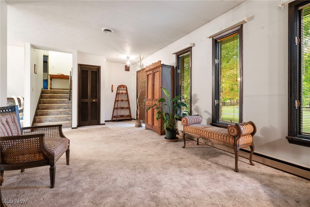 3417 Biltz Road Kent, OH 44240 - Photo 6 of 38 Living area featuring light carpet