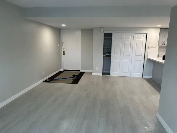 a view of an empty room and window