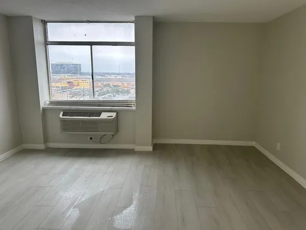 an empty room with a window