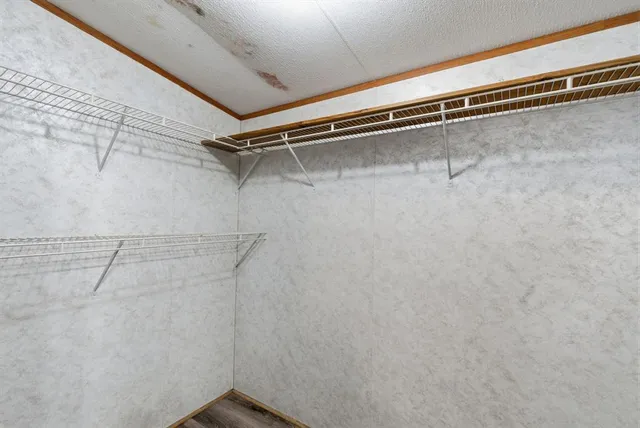 a view of a room with racks on the wall