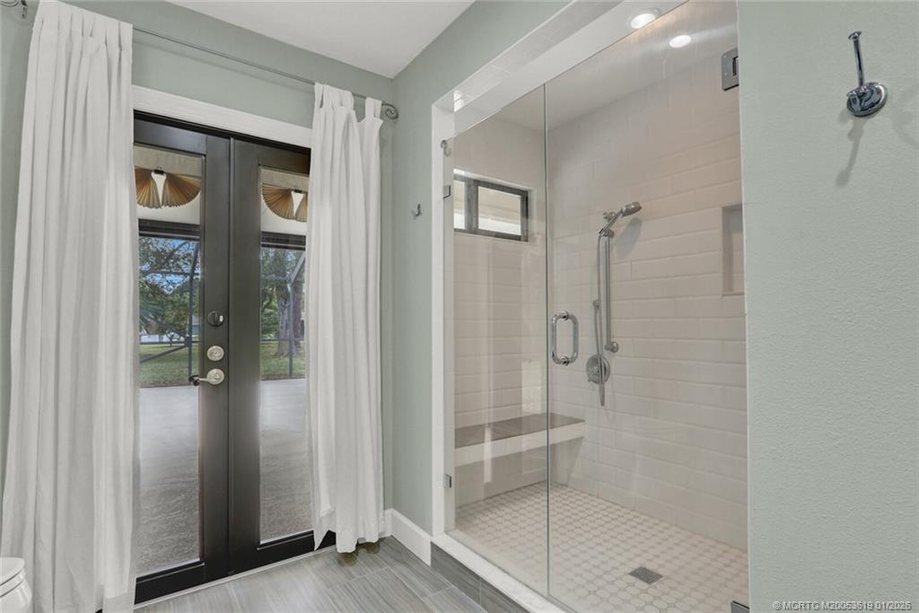 3060 Southeast Darien Road Port St. Lucie, FL 34952 - Photo 22 of 52 a bathroom with a shower