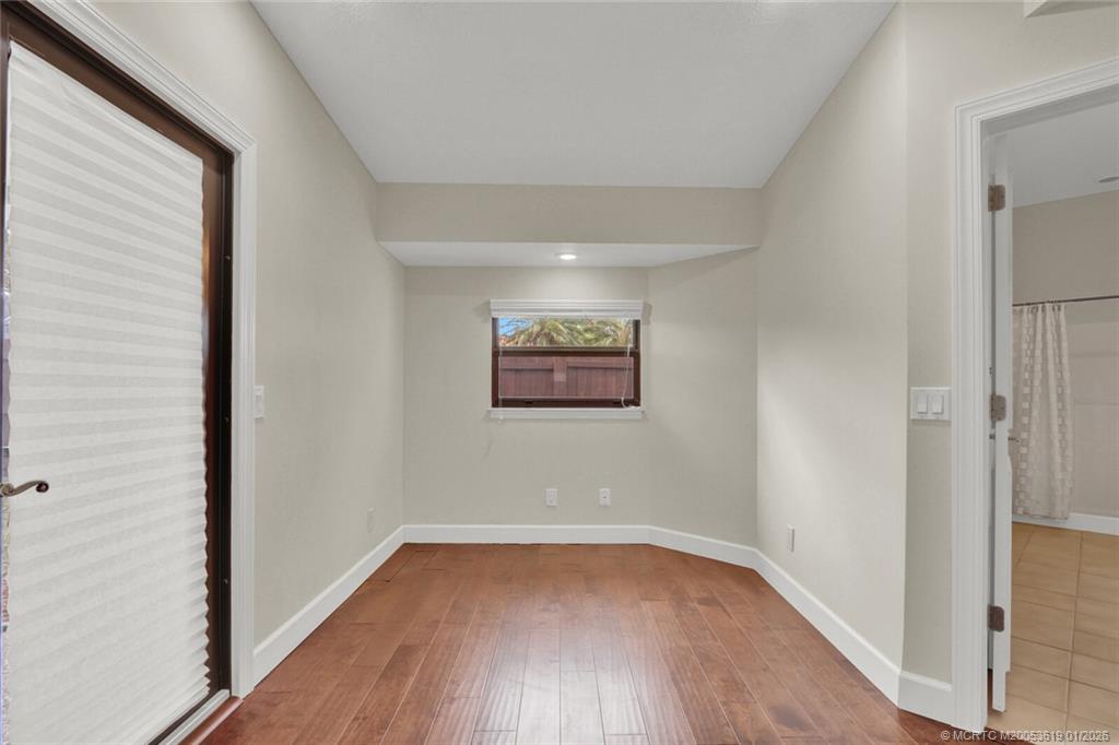 3060 Southeast Darien Road Port St. Lucie, FL 34952 - Photo 32 of 52 a view of a hallway with wooden floor