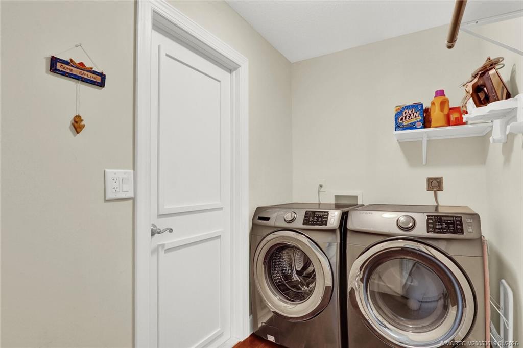 3060 Southeast Darien Road Port St. Lucie, FL 34952 - Photo 35 of 52 a utility room with dryer and washer