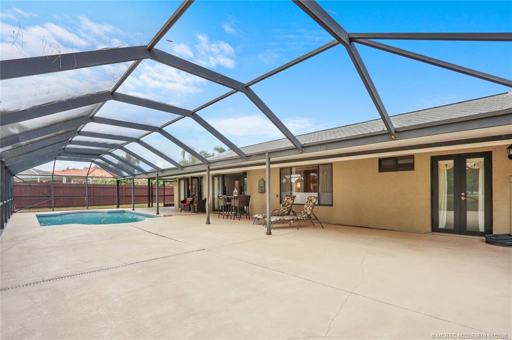 3060 Southeast Darien Road Port St. Lucie, FL 34952 - Photo 40 of 52 a view of pool with yard