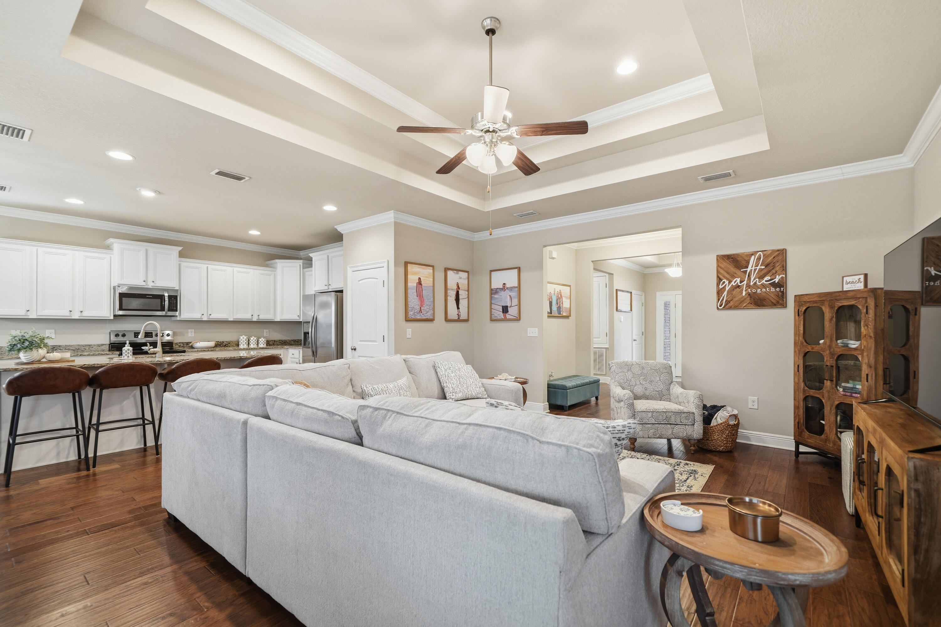 102 Wayne Trail Santa Rosa Beach, FL 32459 - Photo 14 of 35 a living room with furniture kitchen view and a chandelier