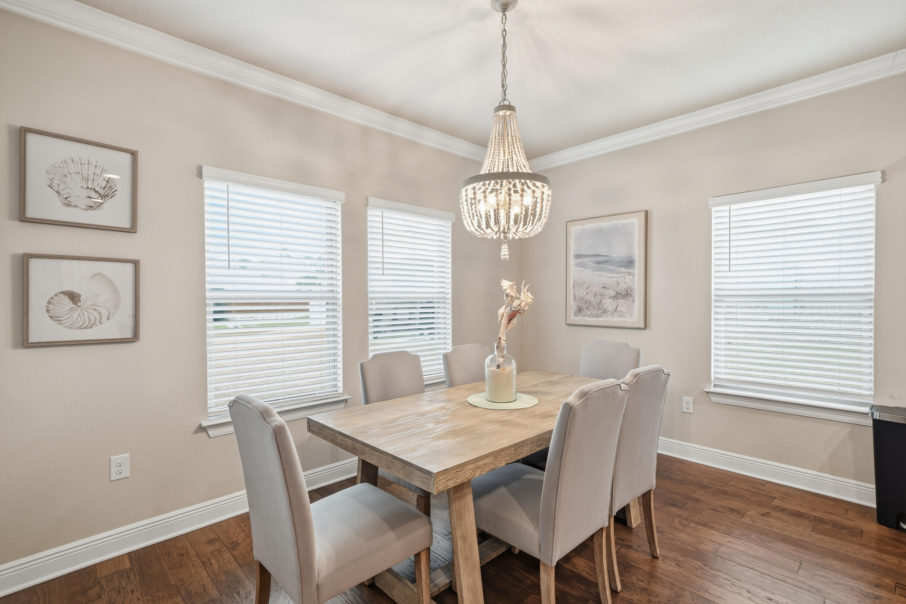 102 Wayne Trail Santa Rosa Beach, FL 32459 - Photo 8 of 35 a view of a dining room with furniture window and wooden floor