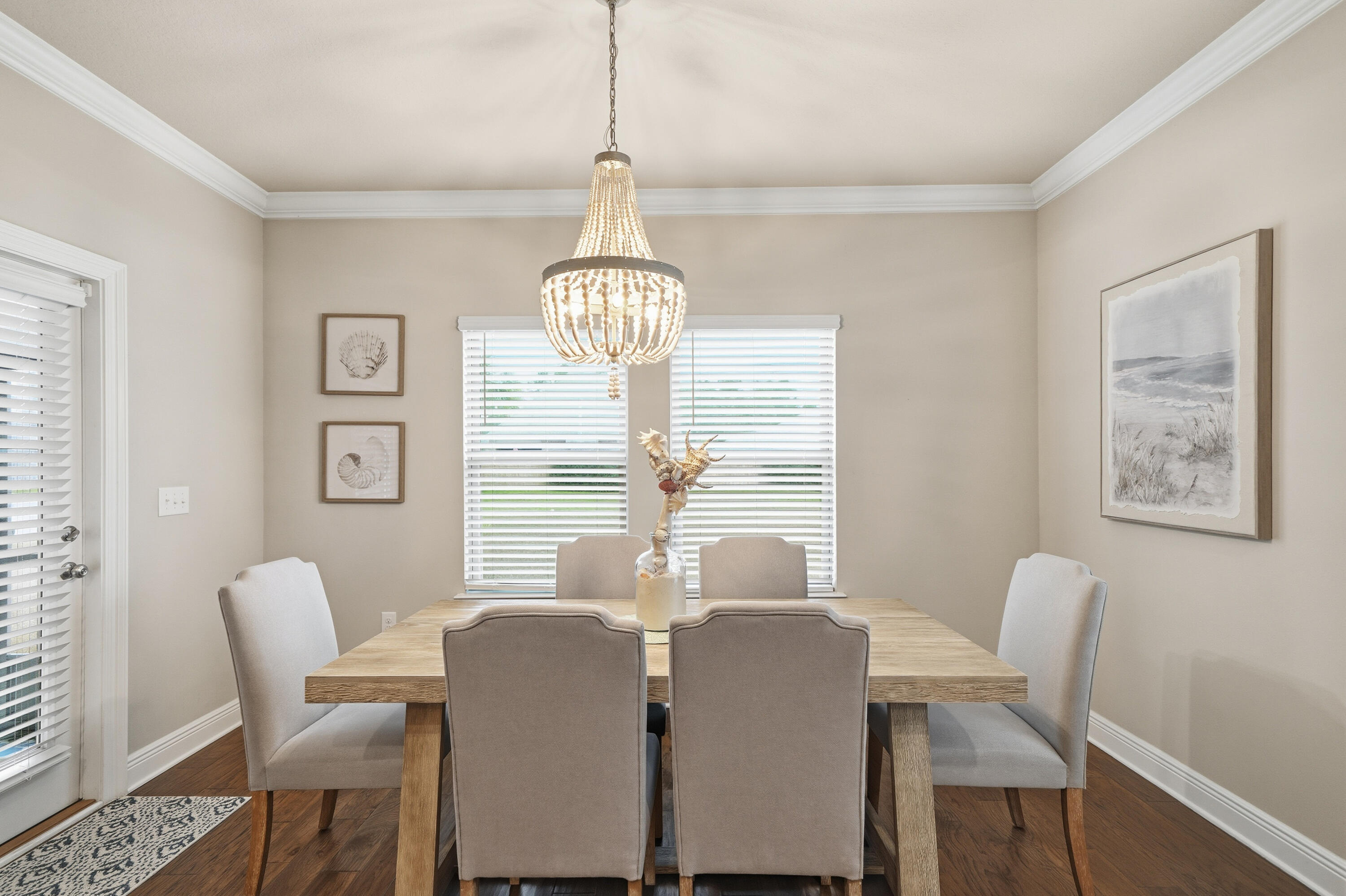 102 Wayne Trail Santa Rosa Beach, FL 32459 - Photo 9 of 35 a view of a dining room with furniture window and wooden floor