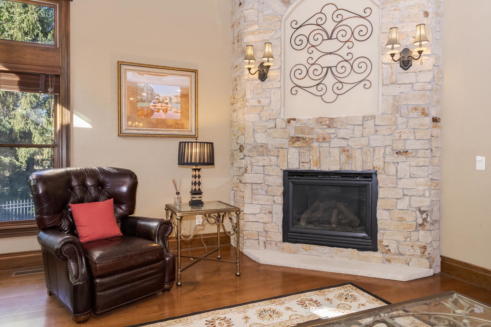 47 Stonebrook Court Bloomington, IL 61704 - Photo 25 of 73 a living room with furniture and a fireplace