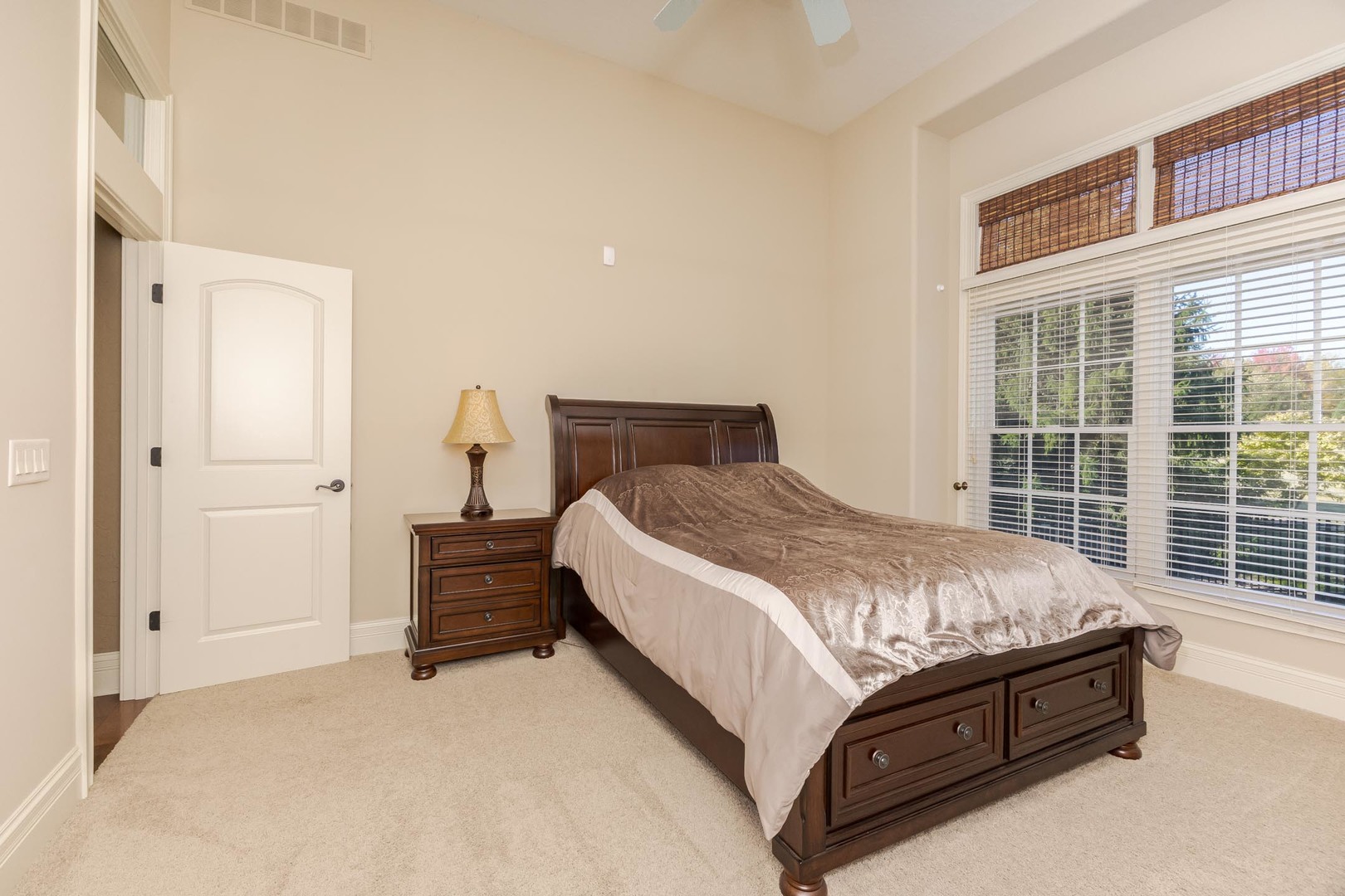 47 Stonebrook Court Bloomington, IL 61704 - Photo 33 of 73 a bed sitting in a spacious bedroom next to a window
