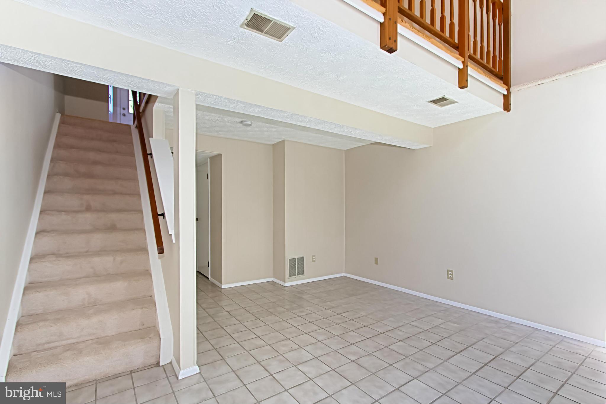 8317 Windfall Road Springfield, VA 22153 - Photo 12 of 19 a view of entryway with stairs