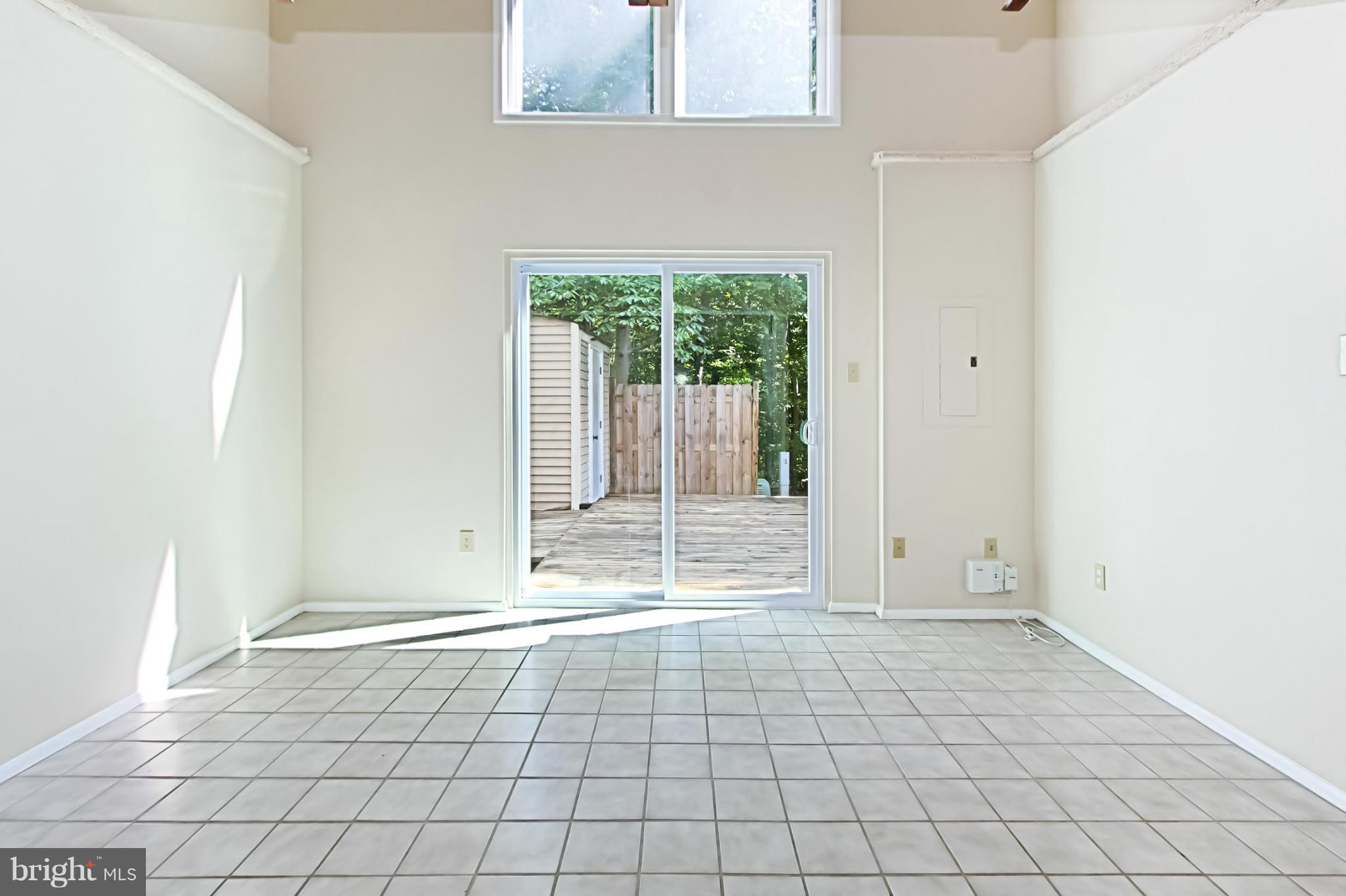 8317 Windfall Road Springfield, VA 22153 - Photo 14 of 19 a view of an empty room with window