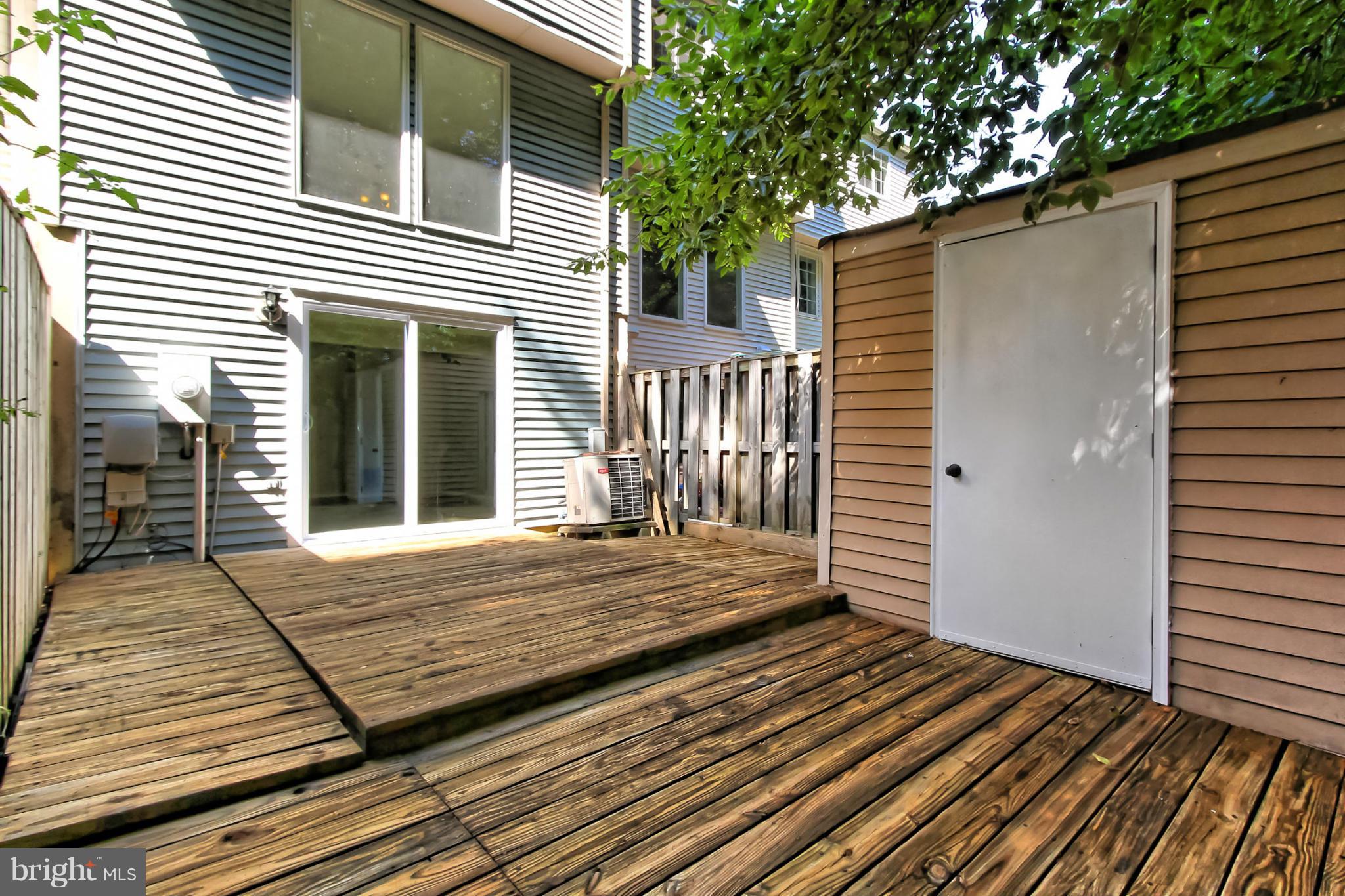 8317 Windfall Road Springfield, VA 22153 - Photo 16 of 19 a view of a wooden deck