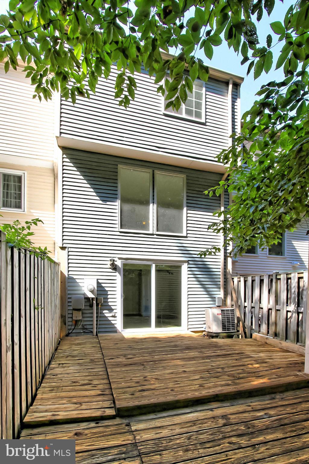 8317 Windfall Road Springfield, VA 22153 - Photo 19 of 19 a front view of a house with a garden