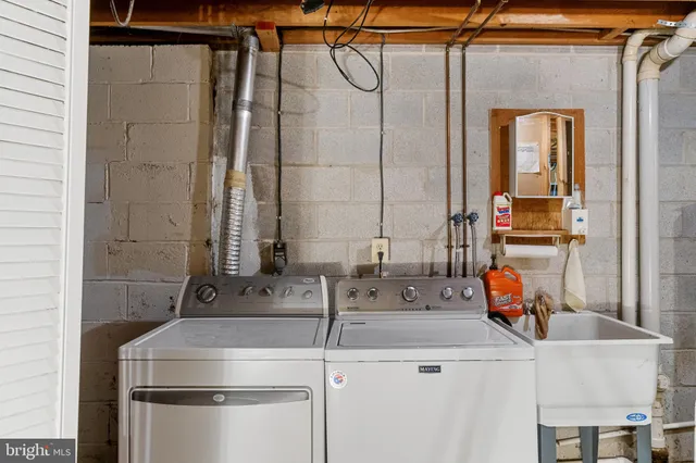 a view of a balcony with wooden fence