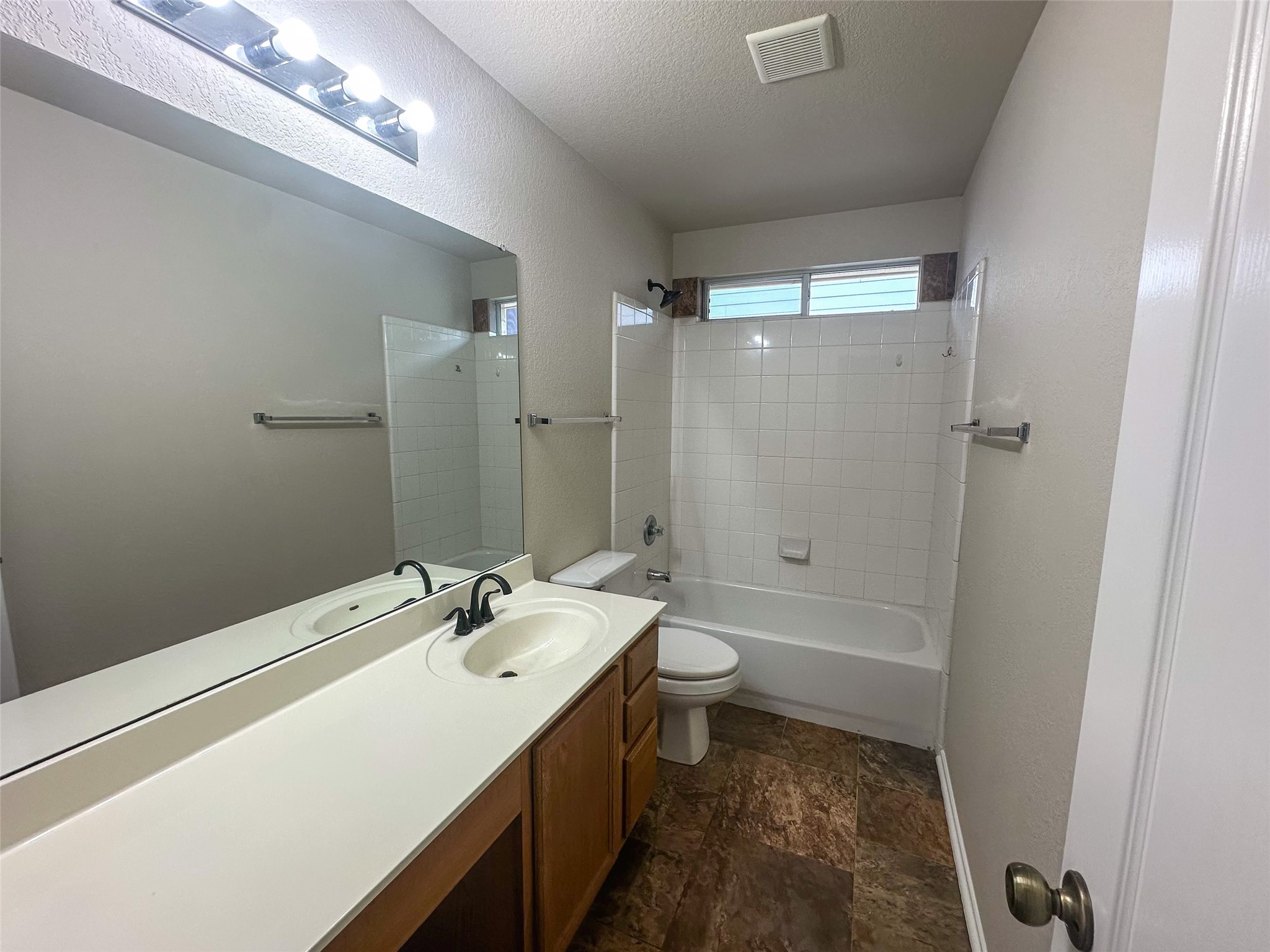 6741 Wayman Ridge San Antonio, TX 78233 - Photo 17 of 21 a bathroom with a sink a toilet and shower