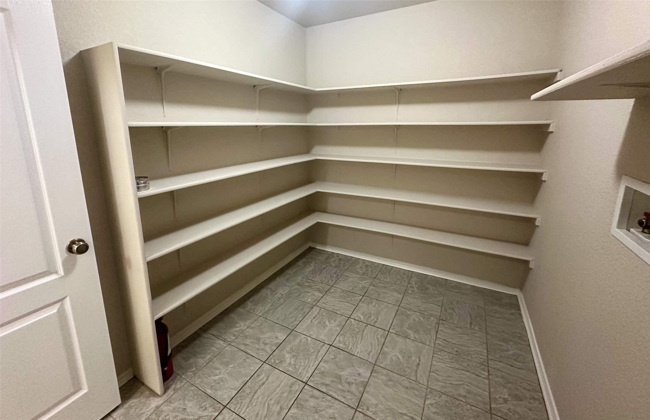 6741 Wayman Ridge San Antonio, TX 78233 - Photo 18 of 21 a view of walk in closet with empty racks